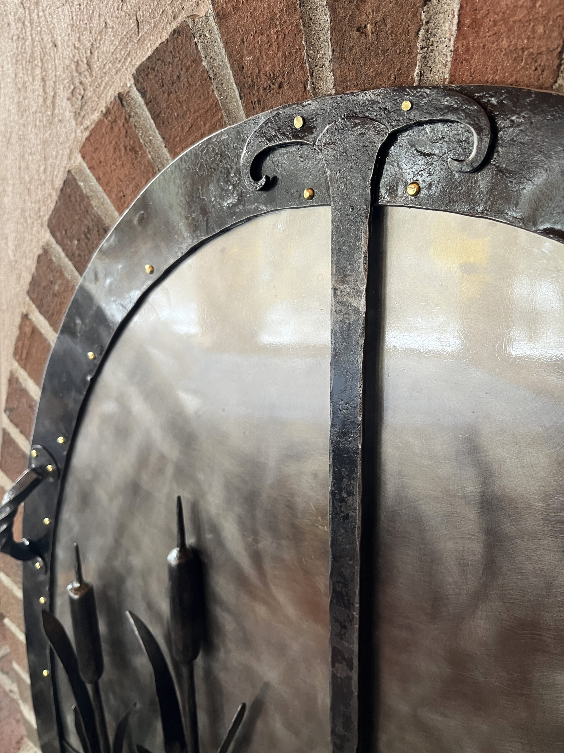 forged fireplace door detail